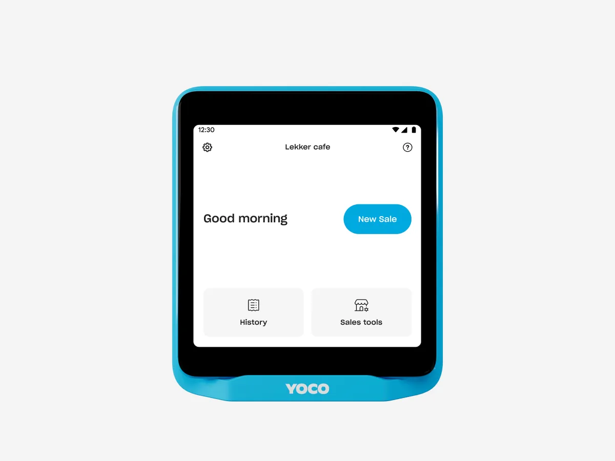 A Yoco Neo Touch card machine displaying a screen with options for "History," "Sales tools," and a "New Sale" button.