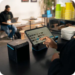 Collage showing Yoco POS systems in use across cafés and retail stores, including tablets, card machines, and payment screens.