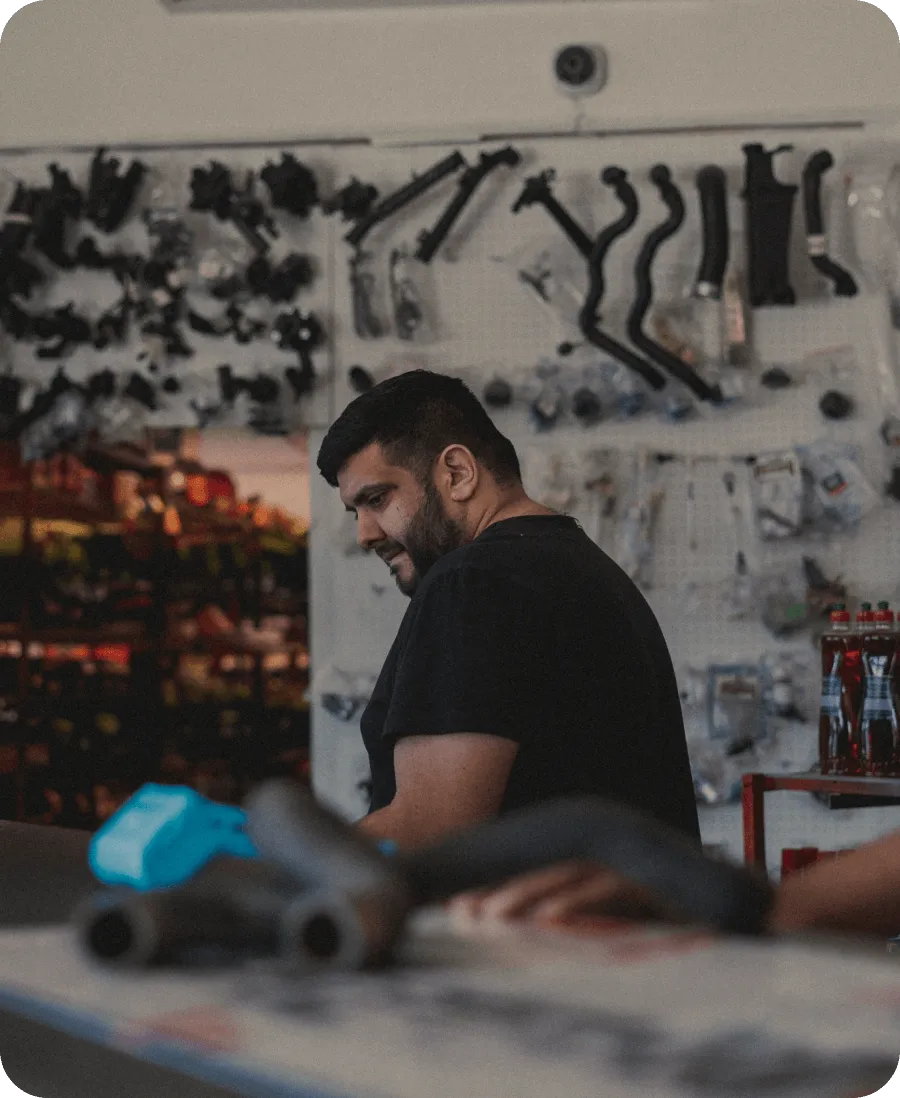A mechanic shop owner upgrading equipment with the help of Yoco Capital funding.